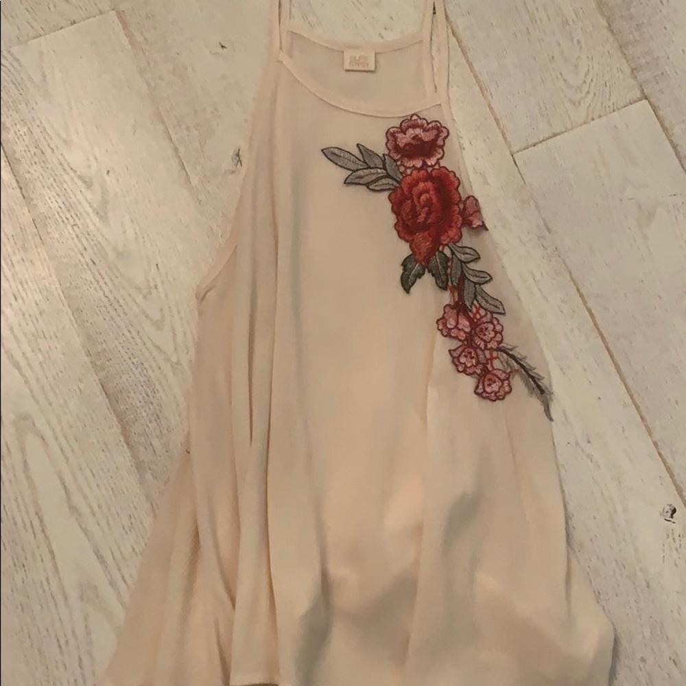 Cream tank top with rose patch